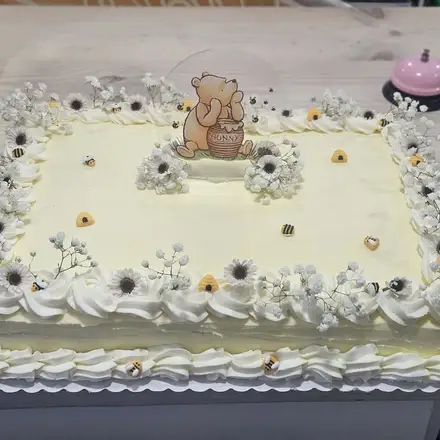Sheet cake with a teddy bear