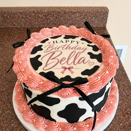 Pink cow-print birthday cake