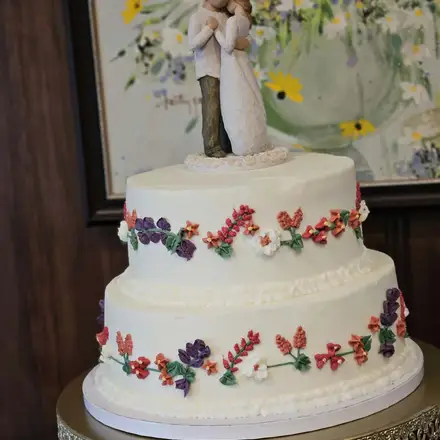 Tiered wedding cake with flowers