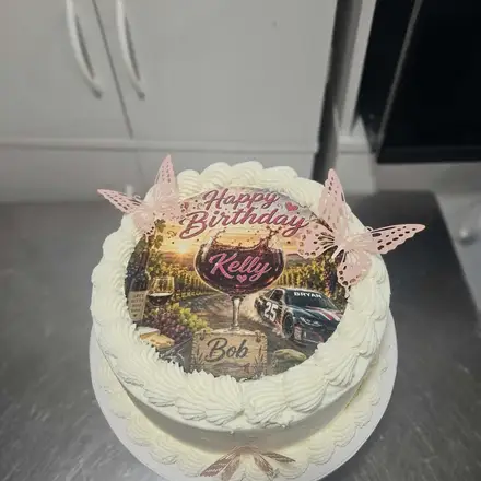 Birthday cake with a photo topper