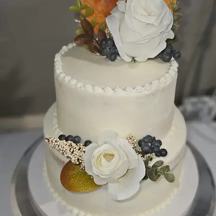White tiered cake with flowers