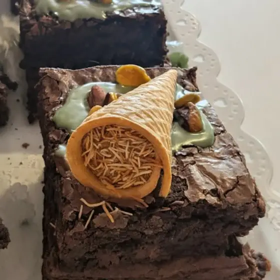 Fudgy brownies topped with a cone of toffee